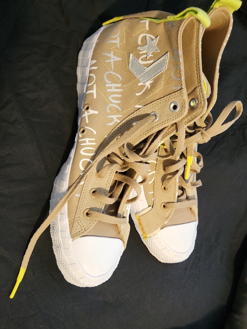 Woman Converse Tan High-Top Sneakers with White Toe and Neon Yellow Accents